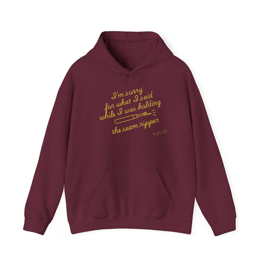 Unisex Heavy Blend™ Hooded Sweatshirt - "Holding Seam Ripper"